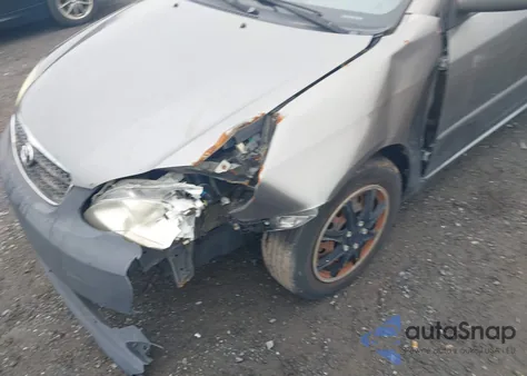 2006 Toyota Corolla Le from USA, damaged, VIN 2T1BR32E66C633593